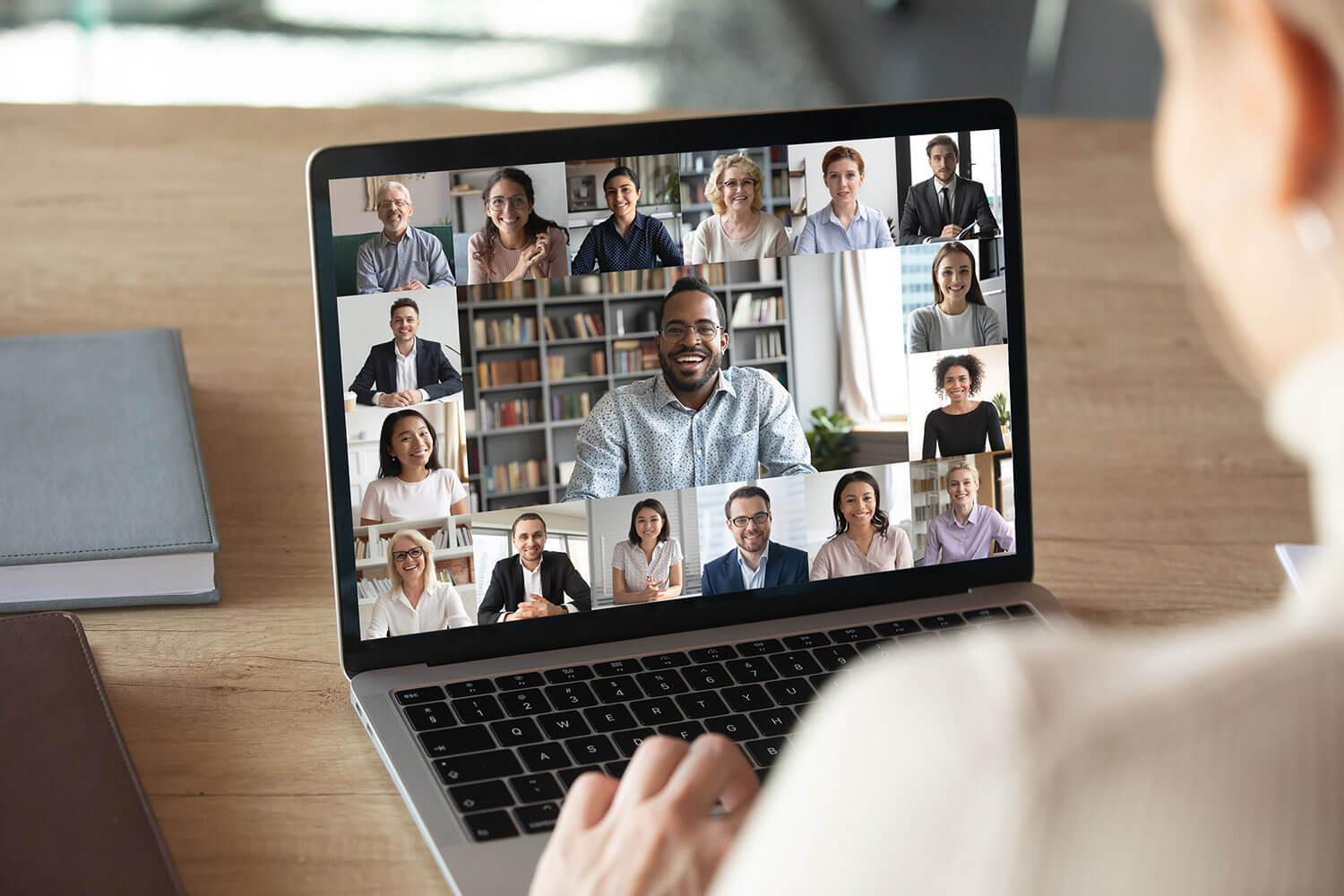 Virtual teams meeting on laptop with lots of participants